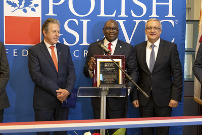 Hon. Rodney E. Hood receives a commemorative plaque from PSFCU Board Chairman Matyszczyk and CEO Chmielewski