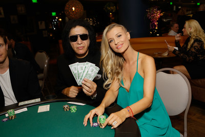 Gene Simmons & Joanna Krupa at Tower Cancer Research Foundation's Cancer Free Generation Celebrity Poker Tournament in 2016.