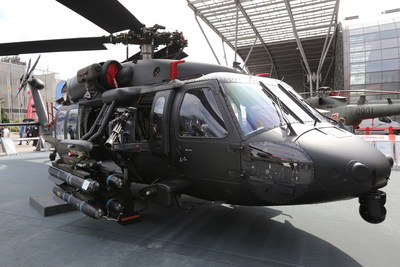 An S-70i Black Hawk helicopter at the MSPO trade show carries a lightweight single-station external stores pylon supporting four Hellfire air-to-ground missiles. The prototype pylon’s drop design offers a wide field of fire to the crew-served machine gun, which also can be locked into a fixed forward position for control by a pilot gunner. An S-70i Black Hawk helicopter at the MSPO trade show carries a lightweight single-station external stores pylon supporting four Hellfire air-to-ground missiles. The prototype pylon’s drop design offers a wide field of fire to the crew-served machine gun, which also can be locked into a fixed forward position for control by a pilot gunner.