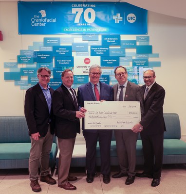 Pictured: Robert Grant, Face the Future Foundation President; Dr. Robert A. Barish, Vice Chancellor for Health Affairs at the University of Illinois at Chicago; Dr. Mimis Cohen, Director of the UI Health Craniofacial Center and Chief of Plastic, Reconstructive and Cosmetic Surgery at UI Health; Dr. Mark Rosenblatt, Dean of the University of Illinois College of Medicine; Dr. Pravin Patel, Chief of Pediatric Plastic and Craniofacial Surgery at UI Health. Pictured: Robert Grant, Face the Future Foundation President; Dr. Robert A. Barish, Vice Chancellor for Health Affairs at the University of Illinois at Chicago; Dr. Mimis Cohen, Director of the UI Health Craniofacial Center and Chief of Plastic, Reconstructive and Cosmetic Surgery at UI Health; Dr. Mark Rosenblatt, Dean of the University of Illinois College of Medicine; Dr. Pravin Patel, Chief of Pediatric Plastic and Craniofacial Surgery at UI Health.
