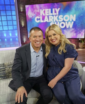 NCL President and CEO Andy Stuart with Norwegian Encore Godmother Kelly Clarkson