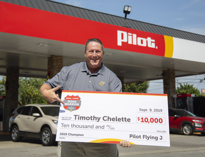 Timothy Chelette, winner of Pilot Flying J's 2019 Road Warrior contest honoring professional drivers, presents $10,000 prize at the Pilot Travel Center in his hometown of Murfreesboro, Tenn.