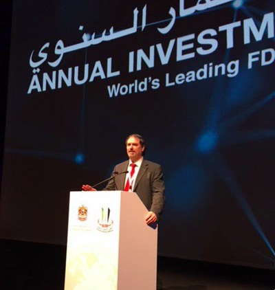 Dr. Christopher Papile on the podium in Dubai, UAE