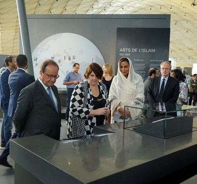 President Francois Hollande, Princess Lamia Bint Majid AlSaud, and Ms. Yannick Lintz during the opening of the new and expanded spaces in the museum's Department of Islamic Art