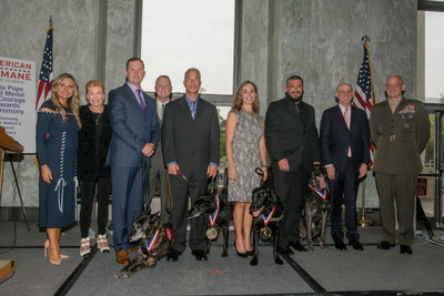 Honoring our warriors’ best friends (left to right): American Humane President & CEO Dr. Robin Ganzert, philanthropist Lois Pope, USAF TSgt Robert Wilson and MWD Troll, USMC Colonel Scott Campbell (Ret.), Patrolman Eric Harris and MWD Emmie, Caroline Zuendel and Sgt. Yeager, Luchian Burke and K-9 Niko, Crown Media Family Networks President and CEO Bill Abbott, and USMC Brigadier General Robert C. Fulford. Photo credit: Beth Caldwell for American Humane