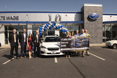 Subaru sells 10-millionth vehicle in the U.S. (L to R) Andrew Sidel (SOA), David Airington (SOA), Jessica Tiedeken (SOA), Barry Jellick (SOA), Rachel Harmon (customer), Marianne Harmon (customer), Kirk Schneider (owner, Nate Wade Subaru), Dr. Craig Harmon (new Impreza owner), Rob Berman (sales manager)