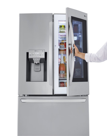 The Craft Ice House features four distinct home settings – a family room, garden patio, whiskey library and game room – with each demonstrating how LG InstaView Refrigerators are the ultimate home entertaining advantage. (PRNewsfoto/LG Electronics USA)