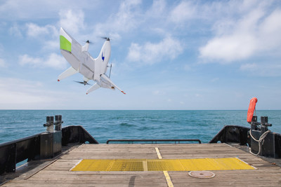 Swift Engineering's Transitional VTOL UAS Autonomously Landing on the Back of a Steel Hull Ship in the Middle of the Ocean