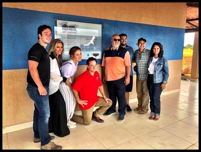 Attending the grand opening of Hope House in Lapão, Brazil are, left to right, Josh Duhon, Tracy Duhon, Abigail Duhon and Troy Duhon of Giving Hope; Arnold Gacita and Andrew of Petra Oil Company; and Antonio Torres and Adriana Torres of Aquaviva.