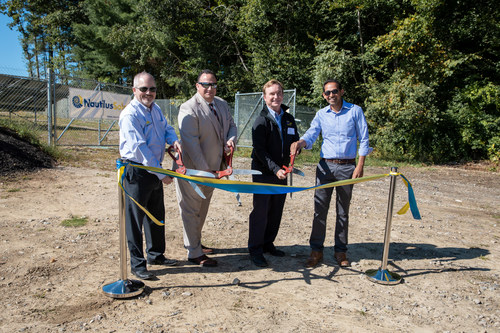 Cutting the ribbon on the Burrillville Solar garden are Greg Lucini, CEO of ISM Solar, Nick Ucci, Deputy Commissioner of RI OER, Jim Rice, Co-CEO of Nautilus Solar, and Kiran Bhatraju, CEO of Arcadia Power.