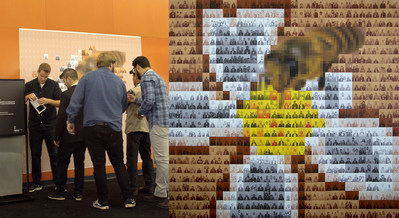 For the Apimondia 2019 congress, MASSIVart developed a mosaic that gradually came to light as participants added pictures of themselves. (CNW Group/Palais des congrès de Montréal)