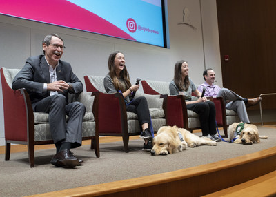 Left to right: St. Jude President and CEO James R. Downing, M.D., child life specialists Brittany Reed, Shandra Taylor, and child life program director Shawn Brasher, discuss the Paws at Play hospital dog program with staff. In front are Puggle and Huckleberry. Left to right: St. Jude President and CEO James R. Downing, M.D., child life specialists Brittany Reed, Shandra Taylor, and child life program director Shawn Brasher, discuss the Paws at Play hospital dog program with staff. In front are Puggle and Huckleberry.