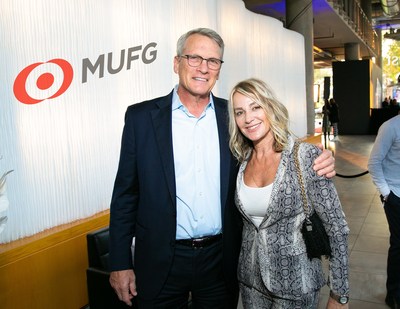 MUFG Regional Executive for the Americas Stephen Cummings and Olympic gold medalist Nadia Com?neci