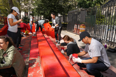 Diageo NA employees painting risers at Manhattan's Columbus Park with Partnerships for Parks.