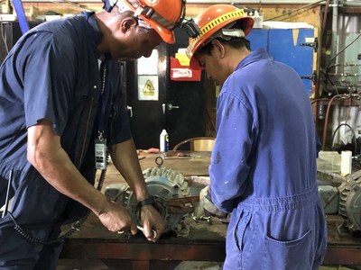 Grand Bahama Shipyard technicians repair electric motors to assist Grand Bahama Utility Company in accelerating the return of fresh-water services on Grand Bahama Island.